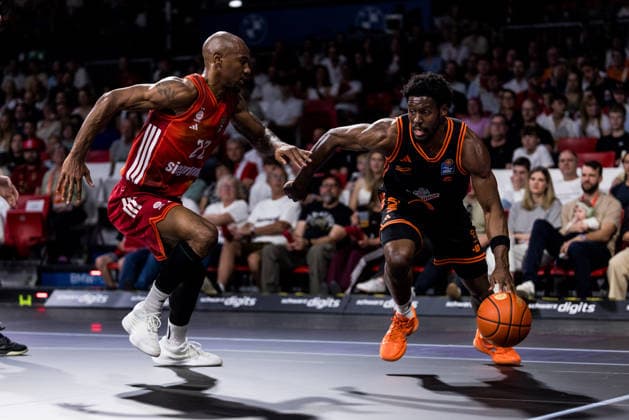 MUNICH, GERMANY - MAY 03: TJ Bamba (Rasta Vechta, 5) controls the ball against Isiaha Mike (FC Bayern Muenchen, 22) during the easyCredit Basketball Bundesliga match between FC Bayern Muenchen vs. Rasta Vechta at BMW Park on matchday 32 of the easyCredit Basketball Bundesliga on May 03, 2026 in Munich, Germany. Bavaria Germany Copyright: xSteffiexWunderlx