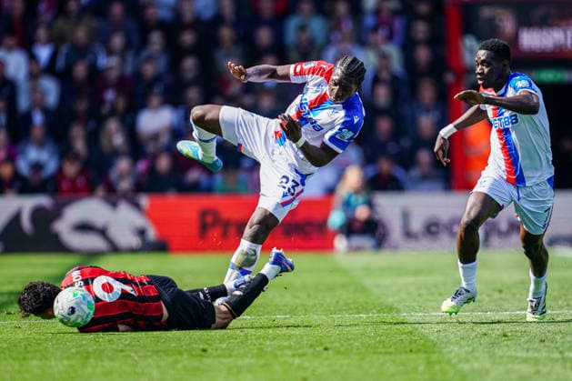 3rd May 2026, Bournemouth, Dorset, England; Premier League Football, AFC Bournemouth versus Crystal Palace; Jaydee Canvot of Crystal Palace falls as he battles for the ball with Evanilson of Bournemouth KamilxKrella