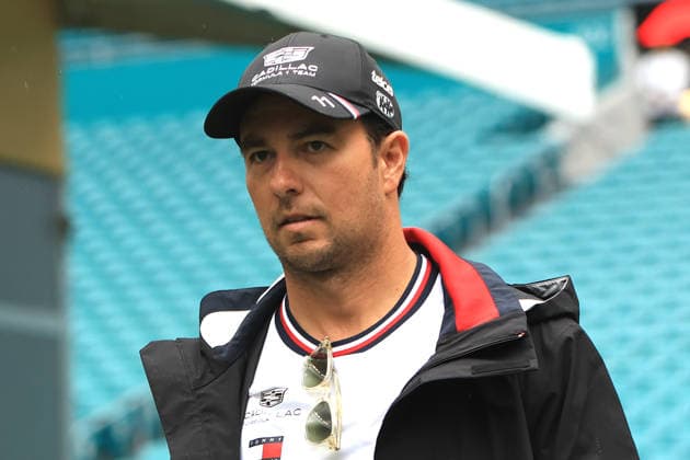 3rd May 2026; Miami International Autodrome, Miami, Florida, United States of America; 2026 FIA Formula 1 Miami Grand Prix Race Day; Sergio Perez (11) of Mexico and Cadillac Formula 1 Team walks in the paddock area JeffxRobinson