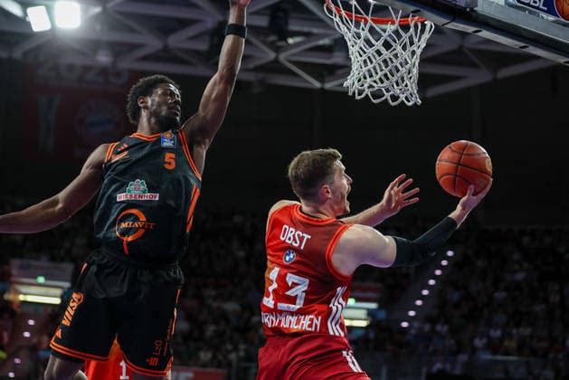 Andreas Obst FC Bayern Basketball, 13 with ball at the basket with TJ Bamba RASTA Vechta, 05 , GER, FC Bayern Basketball vs Rasta Vechta, Basketball, easycredit Basketball Bundesliga, 32 Matchday, Season 2025 2026, 03 05 2026, GER, FC Bayern Basketball vs Rasta Vechta, Basketball, easycredit Basketball Bundesliga, 32 Matchday, Season 2025 2026, 03 05 2026 Munich Copyright: xEibner-Pressefoto JennixMaulx EP_JML