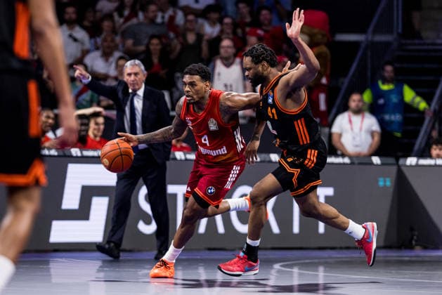 MUNICH, GERMANY - MAY 03: Xavier Rathan-Mayes (FC Bayern Muenchen, 4) controls the ball against Lloyd Pandi (Rasta Vechta, 41) during the easyCredit Basketball Bundesliga match between FC Bayern Muenchen vs. Rasta Vechta at BMW Park on matchday 32 of the easyCredit Basketball Bundesliga on May 03, 2026 in Munich, Germany. Bavaria Germany Copyright: xSteffiexWunderlx