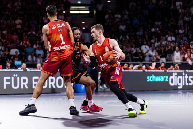 MUNICH, GERMANY - MAY 03: Andreas Andi Obst (FC Bayern Muenchen, 13) controls the ball against Lloyd Pandi (Rasta Vechta, 41) during the easyCredit Basketball Bundesliga match between FC Bayern Muenchen vs. Rasta Vechta at BMW Park on matchday 32 of the easyCredit Basketball Bundesliga on May 03, 2026 in Munich, Germany. Bavaria Germany Copyright: xSteffiexWunderlx