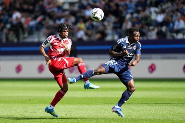 Paris FC v Stade Brestois 29 - Ligue 1 McDonald s 2025 2026 27 Daouda GUINDO (sb29) - 27 Moses SIMON (pfc) during the Ligue 1 McDonald s match between Paris FC and Brest at Stade Jean Bouin on May 3, 2026 in Paris, France. Paris France  Copyright: xFEPx 776348377