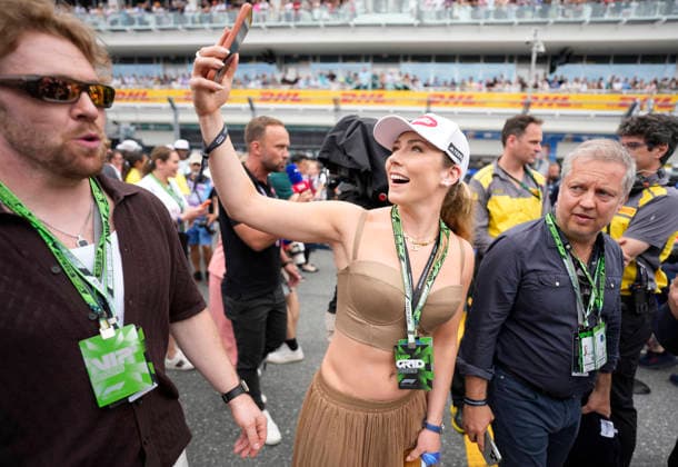 Mikaela Shiffrin takes a selfie on the starting line as she attends the Formula One Miami Grand Prix at the Miami International Autodrome in Miami Gardens, Florida on Sunday, May 3, 2026.  MIA20260503903 GREGxNASH