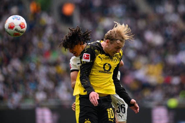 MOENCHENGLADBACH, GERMANY - 3 MAY, 2026: Julian Brandt in areal duel vs Wael Mohya - The football match of 1. Bundesliga Borussia Moenchengladbach vs Borussia Dortmund at Borussia Park.  Copyright: xVitaliixKliuievx