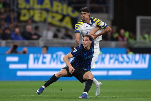 Milan, Italy, 2nd May 2026. Francesco Pio Esposito of FC Internazionale tussles with Mariano Troilo of Parma Calcio during the FC Internazionale vs Parma Calcio 1913 Serie A match at Giuseppe Meazza, Milan. Picture credit should read: Jonathan Moscrop Sportimage EDITORIAL USE ONLY. No use with unauthorised audio, video, data, fixture lists, club league logos or live services. Online in-match use limited to 120 images, no video emulation. No use in betting, games or single club league player publications. SPI_012_JM_INTER_PARMA SPI-4756-0012