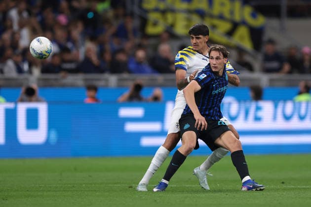 Milan, Italy, 2nd May 2026. Francesco Pio Esposito of FC Internazionale tussles with Mariano Troilo of Parma Calcio during the FC Internazionale vs Parma Calcio 1913 Serie A match at Giuseppe Meazza, Milan. Picture credit should read: Jonathan Moscrop Sportimage EDITORIAL USE ONLY. No use with unauthorised audio, video, data, fixture lists, club league logos or live services. Online in-match use limited to 120 images, no video emulation. No use in betting, games or single club league player publications. SPI_013_JM_INTER_PARMA SPI-4756-0013