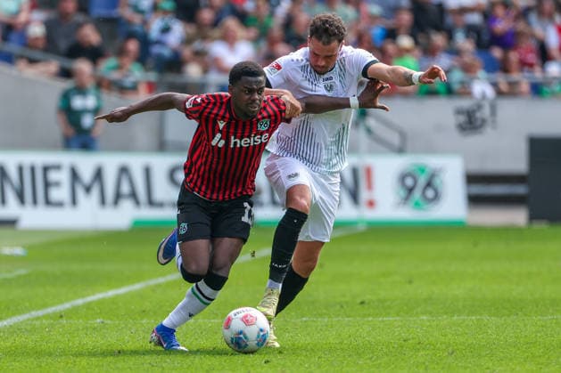 2 Bundesliga Hannover 96 SC Preußen Münster on 03 05 2026 at Heinz von Heiden Arena in Hannover Noel Aseko Nkili Hannover 15 vs Yassine Bouchama Muenster 5 MH