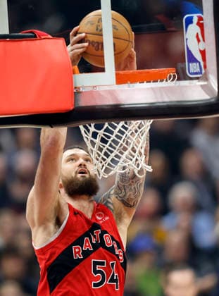 Toronto Raptors Sandro Mamukelashvili (54) throws down a dunk in the first quarter against the Cleveland Cavaliers in Cleveland, Ohio Sunday May 3, 2026.  CLE20260503109 AARONxJOSEFCZYK