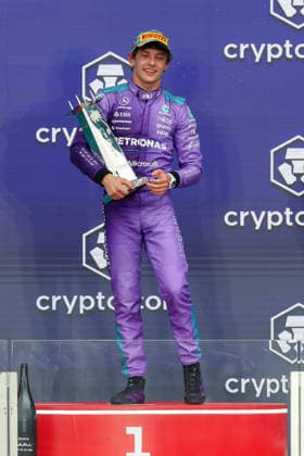 MIAMI GARDENS, FL - MAY 03: Kimi Antonelli (12) of Italy and Mercedes-AMG PETRONAS Formula One Team holds the championship trophy on the podium after winning the Formula 1 Crypto.com Grand Prix on May 3, 2026, at Miami International Autodrome in Miami Gardens, Florida. (Photo by David Buono Icon Sportswire) AUTO: MAY 03 F1 Miami Grand Prix EDITORIAL USE ONLY Icon2605030251