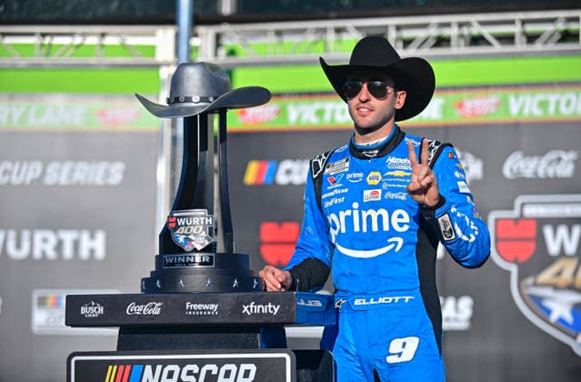FORT WORTH, TX - MAY 03: Chase Elliott ( 9 Hendrick Motorsports Amazon Prime Chevrolet) poses next to the trophy after winning NASCAR, Motorsport, USA Cup Series Wurth 400 on May 3, 2026, at the Texas Motor Speedway in Fort Worth, TX. (Photo by Austin McAfee Icon Sportswire) AUTO: MAY 03 NASCAR Cup Series Wurth 400 EDITORIAL USE ONLY Icon260503001