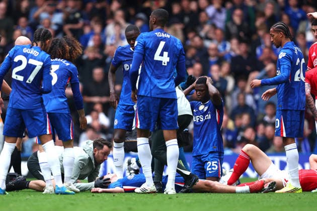 London, England, 4th May 2026. Jesse Derry of Chelsea receives medical attention before being stretchered off during the Chelsea vs Nottingham Forest Premier League match at Stamford Bridge, London. Picture credit should read: Paul Terry Sportimage EDITORIAL USE ONLY. No use with unauthorised audio, video, data, fixture lists, club league logos or live services. Online in-match use limited to 120 images, no video emulation. No use in betting, games or single club league player publications. SPI_023_PT_Chelsea_Notts_Forest SPI-4780-0023