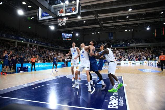 Marcel Keßen 15 MLP Academics Heidelberg fights for the rebound against Jure Planinic 44 Syntainics MBC and Niklas Würzner 2 MLP Academics Heidelberg in the SNP Dome Rebound battle in the SNP Dome Copyright: xMichaelxGelhardtx