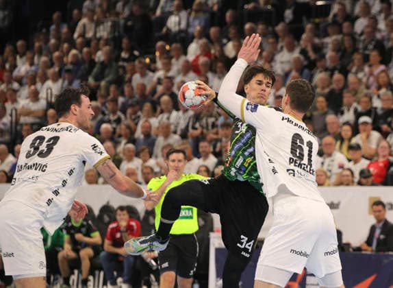 photo Goal throw from Ognjen Cenic Nasice against Hendrik Pekeler Kiel and left Veron Nacinovic Kiel Handball Men on Tue 05 05 2026 Mens EHF European League , THW Kiel RK Nexe Nasice