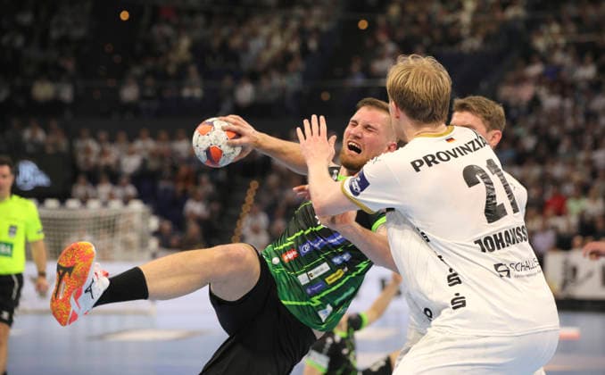 photo Goal throw from Tin LUCIN Nasice against Eric Johansson Kiel and Magnus Landin covered Handball Men on Tue 05 05 2026 Mens EHF European League , THW Kiel RK Nexe Nasice