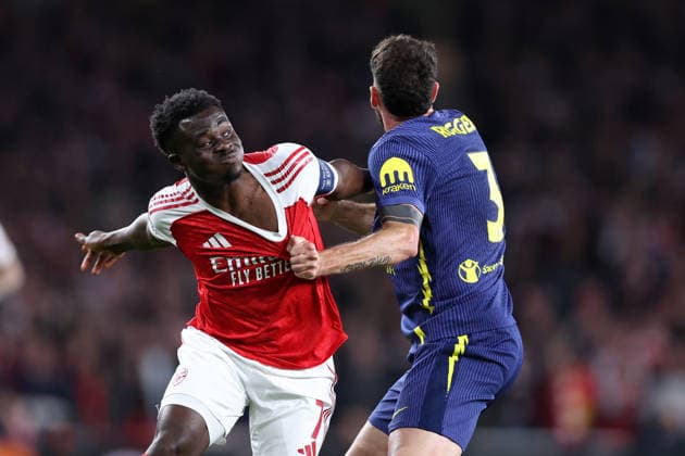 London, England, 5th May 2026. Bukayo Saka of Arsenal and Matteo Ruggeri of Atletico Madrid tussle for the ball during the Arsenal vs Atletico Madrid UEFA Champions League match at the Emirates Stadium, London. Picture credit should read: David Klein Sportimage EDITORIAL USE ONLY. No use with unauthorised audio, video, data, fixture lists, club league logos or live services. Online in-match use limited to 120 images, no video emulation. No use in betting, games or single club league player publications. SPI_070_DK_Arsenal_Athletico_Madrid SPI-4781-0070