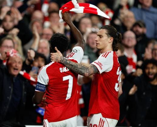 Bukayo Saka of Arsenal celebrates scoring the opening goal with Riccardo Calafiori Arsenal v Atletico Madrid, Football, UEFA Champions League, Semi-Final 2nd Leg, Emirates Stadium, Islington, London, UK - 05 05 2026  Copyright: xMattxImpey Shutterstockx 16860940aa