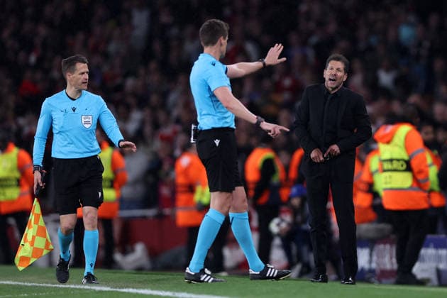 London, England, 5th May 2026. Diego Simeone manager of Atletico Madrid is gestured to by referee, Daniel Siebert during the Arsenal vs Atletico Madrid UEFA Champions League match at the Emirates Stadium, London. Picture credit should read: David Klein Sportimage EDITORIAL USE ONLY. No use with unauthorised audio, video, data, fixture lists, club league logos or live services. Online in-match use limited to 120 images, no video emulation. No use in betting, games or single club league player publications. SPI_141_DK_Arsenal_Athletico_Madrid SPI-4781-0141