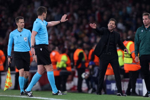 London, England, 5th May 2026. Diego Simeone manager of Atletico Madrid is gestured to by referee, Daniel Siebert during the Arsenal vs Atletico Madrid UEFA Champions League match at the Emirates Stadium, London. Picture credit should read: David Klein Sportimage EDITORIAL USE ONLY. No use with unauthorised audio, video, data, fixture lists, club league logos or live services. Online in-match use limited to 120 images, no video emulation. No use in betting, games or single club league player publications. SPI_142_DK_Arsenal_Athletico_Madrid SPI-4781-0142