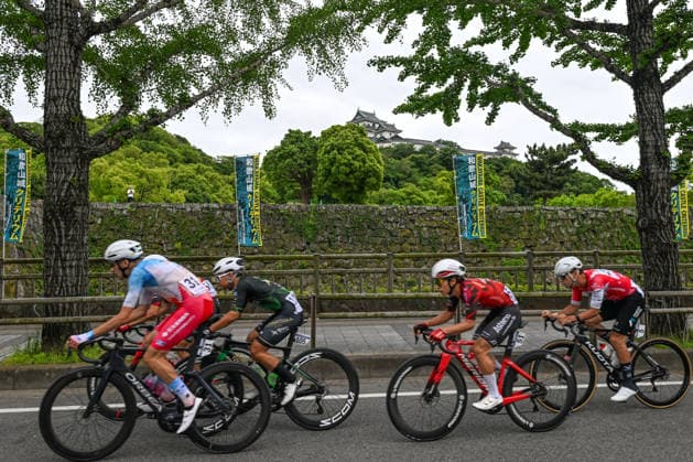 James Gardner Wins The 2026 Wakayama Castle Criterium WAKAYAMA, JAPAN - MAY 6: Thomas Lebas (No. 31) of Kinan Racing Team, Aiman Cahyadi (No. 105) of Nusantara Cycling Team, Atsushi Oka (No. 51) of Astemo Utsunomiya Blitzen, and Yoshiki Terada (No. 23) of JCL Team UKYO speed past the historic Wakayama Castle during the Wakayama Castle Criterium, on May 6, 2026, in Wakayama City, Japan. Wakayama Japan  Copyright: xArturxWidakx originalFilename:widak-jamesgar260506_npHOg.jpg