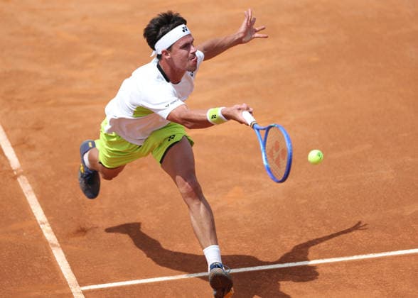 (260506) -- ROME, May 6, 2026 -- Daniel Altmaier hits a return during the men s singles first round match between Zhang Zhizhen of China and Daniel Altmaier of Germany at the ATP, Tennis Herren Italian Open in Rome, Italy, May 6, 2026. ) (SP)ITALY-ROME-TENNIS-ATP-ITALIAN OPEN-ZHANG ZHIZHEN VS DANIEL ALTMAIER LixJing 