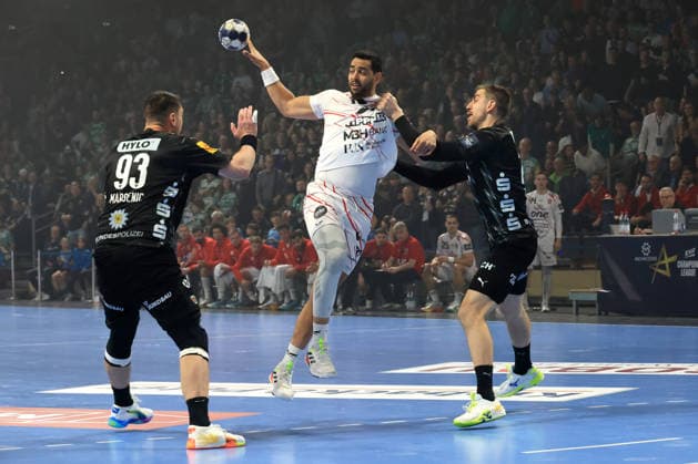 DEU, Machineseeker EHF Champions League, Fuechse Berlin vs One VeszprŽm HC, 06 05 2026, Max Schmeling Halle, Berlin, DEU, Machineseeker EHF Champions League, Fuechse Berlin vs One VeszprŽm HC, in the picture Mijajlo Marsenic Fuechse Berlin 93 , Nejc Cehte Fuechse Berlin 22 , Ahmed Hesham Veszprem 15 nordphotoxGmbHx xEngler nph00076