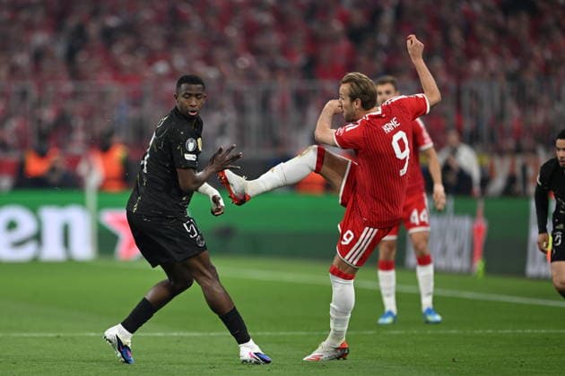 FC Bayern Munich v PSG - UEFA Champions League MUNICH, GERMANY - MAY6 Pacho of Paris Saint-Germain in action against Harry Kane of FC Bayern Munich during the UEFA Champions League Semi-Final Second Leg match between FC Bayern Munich and Paris Saint-Germain at Football Arena Munich in Munich, Germany, on May 6, 2026. Halil Sagirkaya Anadolu Munich Germany. Editorial use only. Please get in touch for any other usage.  Copyright: x2026xAnadoluxHalilxSagirkayax