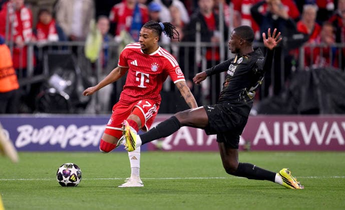 FOOTBALL CHAMPIONS LEAGUE SEASON 2025 2026 semi-final second leg 06 05 2026 FC Bayern Muenchen Paris Saint Germain Michael Olise left, FC Bayern Muenchen vs Nuno Mendes right, Paris Saint Germain