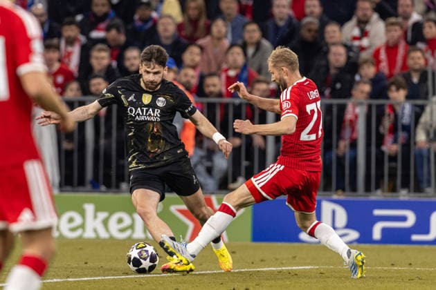 Kvicha Kvaratskhelia FC Paris Saint Germain and Konrad Laimer FC Bayern München battle for the ball during the UEFA Champions League 2025 26 Semi Final Second Leg match between FC Bayern München and Paris Saint Germain at Football Arena Munich on May 6, 2026 in Munich, Germany