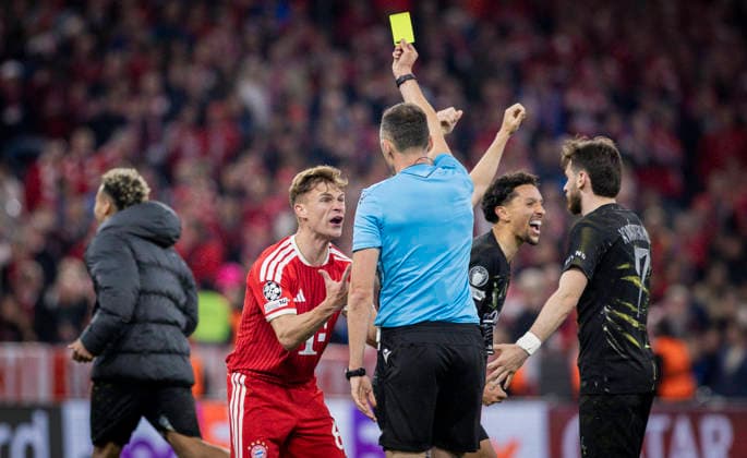 Munich, Germany 06th May 2026 Referee Joao Pinheiro POR shows Joshua Kimmich FCB the yellow card FC Bayern Munich Paris Saint Germain 06 05 2026
