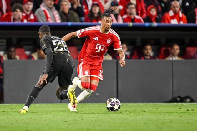 Nuno Mendes Paris Saint Germain FC and Michael Olise FC Bayern München battle for the ball during the UEFA Champions League 2025 26 Semi Final Second Leg match between FC Bayern München and Paris Saint Germain at Football Arena Munich on May 6, 2026 in Munich, Germany Photo by Harry Langer DeFodi Images