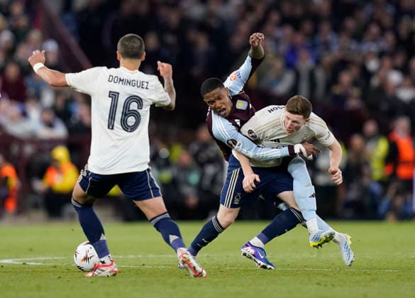 Birmingham, England, 7th May 2026. Ezri Konsa of Aston Villa tackles Elliot Anderson of Nottingham Forest during the Aston Villa vs Nottingham Forest UEFA Europa League semi final match 2nd leg match at Villa Park, Birmingham. Picture credit should read: Andrew Yates Sportimage EDITORIAL USE ONLY. No use with unauthorised audio, video, data, fixture lists, club league logos or live services. Online in-match use limited to 120 images, no video emulation. No use in betting, games or single club league player publications. SPI_065_AY_Villa_Forest SPI-4782-0065