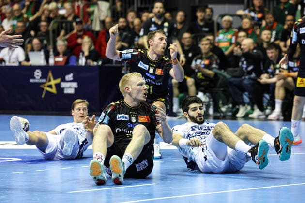 Magnus Saugstrup SC Magdeburg,23 and Imanol Garciandia SC Pick Szeged,41 Quarterfinals Handball Machineseeker Champions League Season 2025 2026 SC Magdeburg vs SC Pick Szeged at the GETEC Arena in Magdeburg Action,Handball,Germany,07 05 2026