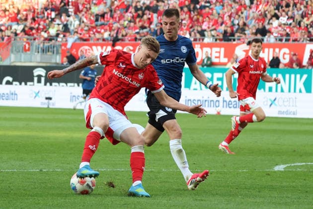 08 05 2026, xrekx, Fußball 2 Bundesliga, 1 FC Kaiserslautern Arminia Bielefeld v l Norman Bassette 1 FC Kaiserslautern Robin Knoche Arminia Bielefeld Zweikampf, Aktion, action, battle for the ball DFL DFB REGULATIONS PROHIBIT ANY USE OF PHOTOGRAPHS as IMAGE SEQUENCES and or QUASI VIDEO Kaiserslautern