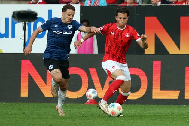 08 05 2026, xrekx, Fußball 2 Bundesliga, 1 FC Kaiserslautern Arminia Bielefeld v l Felix Hagmann Arminia Bielefeld Dion Hofmeister 1 FC Kaiserslautern Zweikampf, Aktion, action, battle for the ball DFL DFB REGULATIONS PROHIBIT ANY USE OF PHOTOGRAPHS as IMAGE SEQUENCES and or QUASI VIDEO Kaiserslautern