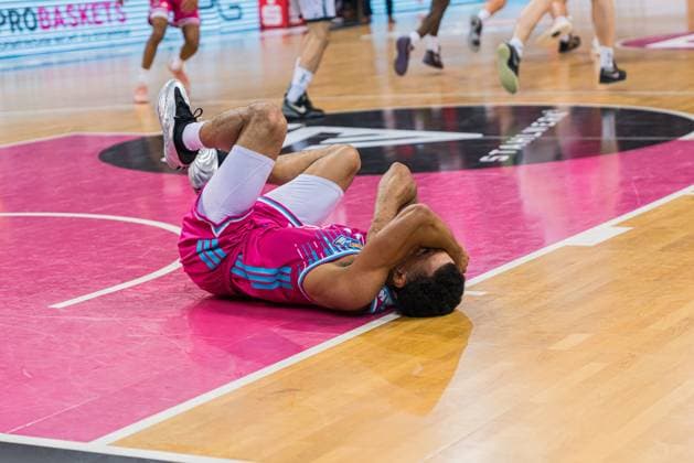 Joel Aminu 21 Telekom Baskets Bonn with an injury on the floor on matchday 33 of the EasyCredit BBL in Bonn EasyCredit BBL Telekom Baskets Bonn vs VET Concept Gladiators Trier Copyright: xFeyzullahxGökalp feyzofsportsx
