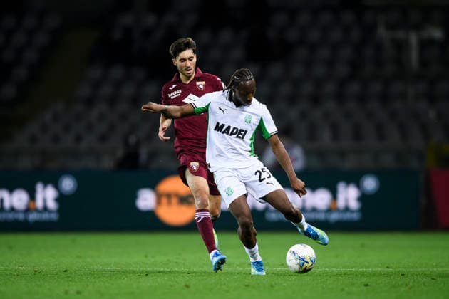 Torino FC v US Sassuolo - Serie A Woyo Coulibaly of US Sassuolo competes for the ball with Rafel Obrador of Torino FC during the Serie A football match between Torino FC and US Sassuolo. Turin Italy Copyright: xNicolòxCampox
