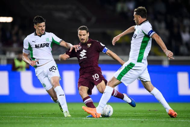 Torino FC v US Sassuolo - Serie A Nikola Vlasic of Torino FC competes for the ball with Tarik Muharemovic of US Sassuolo and Nemanja Matic of US Sassuolo during the Serie A football match between Torino FC and US Sassuolo. Turin Italy Copyright: xNicolòxCampox