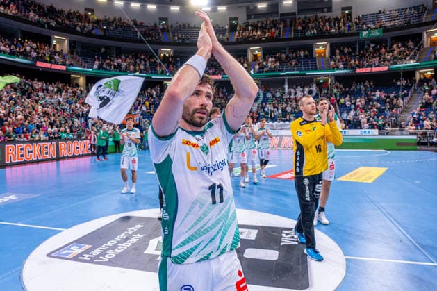 Lukas Binder SC DHfK Leipzig, No. 11 v l , TSV Hannover Burgdorf green against SC DHfK Leipzig white on matchday 31 of the 2025 2026 season in the DAIKIN Handball Bundesliga 08 05 2026, ZAG Arena Hannover, GER , Copyright: xJanxGuentherx xTSVxHannover-Burgdorfx