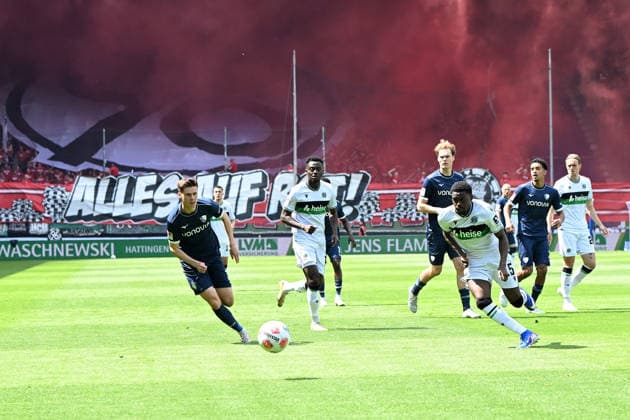 Oliver Olsen VfL Bochum and Noel Aseko Hannover 96 battle for the ball during the 2 Bundesliga match between VfL Bochum and Hannover 96 at Vonovia Ruhrstadion on May 09, 2026 in Bochum, Germany Germany Photo by Ralf Treese DeFodi Images Oliver Olsen VfL Bochum and Noel Aseko Hannover 96 battle for the ball during the 2 Bundesliga match between VfL Bochum and Hannover 96 at Vonovia Ruhrstadion on May 9, 2026 in Bochum, Germany Photo by Ralf Treese DeFodi Images Photo by Ralf Treese DeFodi Images