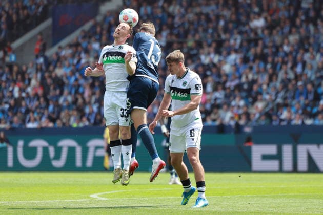 Soccer 2 Bundesliga 33 Matchday VfL Bochum Hannover 96 on 09 05 2026 at Vonovia Ruhrstadion in Bochum Maurice Neubauer Hannover , left Oliver Olsen Bochum , center Maik Nawrocki Hannover , right DFL regulations prohibit any use of photographs as image sequences and or quasi video xJRx