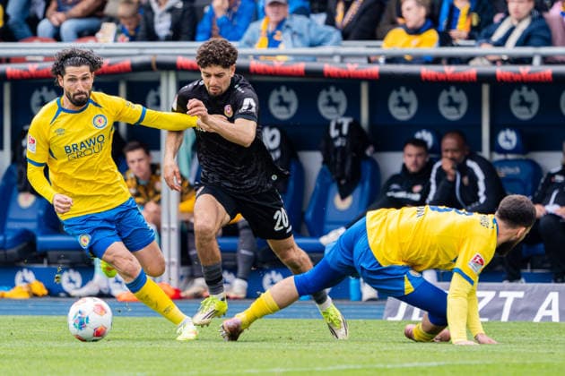 Braunschweig, Germany 09 May 2026 2 BL 2025 2026 Sp 33 Eintracht Braunschweig vs SG Dynamo Dresden In the picture from left in duel Fabio Kaufmann Eintracht , Ben Bobzien Dresden and Mehmet Aydin Eintracht DFL DFB regulations prohibit any use of photographs as image sequences and or quasi video Eintracht Stadion Niedersachsen Copyright: xFotostandx xKruczynskix