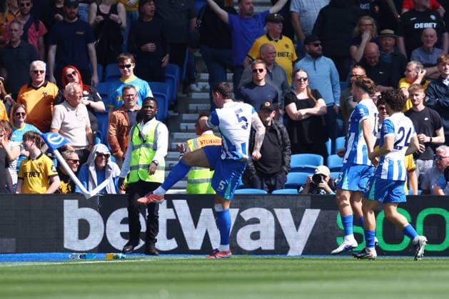 Brighton and Hove, England, 9th May 2026. Lewis Dunk of Brighton and Hove Albion kicks the corner flag as he celebrates after scoring to make it 2-0 during the Brighton and Hove Albion vs Wolverhampton Wanderers Premier League match at the AMEX Stadium, Brighton and Hove. Picture credit should read: Paul Terry Sportimage EDITORIAL USE ONLY. No use with unauthorised audio, video, data, fixture lists, club league logos or live services. Online in-match use limited to 120 images, no video emulation. No use in betting, games or single club league player publications. SPI_016_PT_Brighton_Wolves SPI-4789-0016