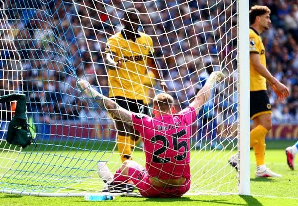 Daniel Bentley of Wolverhampton Wanderers falls into the net after making a save from Danny Welbeck of Brighton and Hove Albion. Brighton and Hove Albion v Wolverhampton Wanderers, Premier League, Football, American Express Community Stadium, Brighton , UK - 09 May 2026Brighton American Express Community Stadi United Kingdom EDITORIAL USE ONLY No use with unauthorised audio, video, data, fixture lists, club league logos or live services. Online in-match use limited to 120 images, no video emulation. No use in betting, games or single club league player publications.  Copyright: xJamesxMarsh Shutterstockx 16861685ak