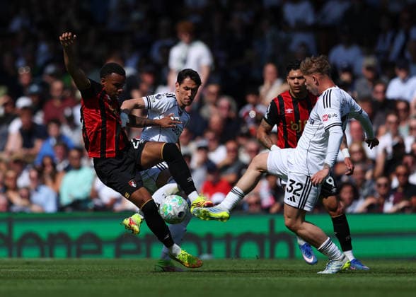 9th May 2026; Craven Cottage, Fulham, London, England; Premier League Football, Fulham versus Bournemouth; Junior Kroupi of AFC Bournemouth under pressure from Emile Smith Rowe and Sasa Lukic of Fulham JPxFletcher