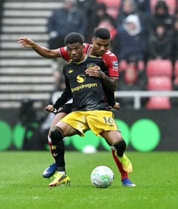Amad Diallo of Manchester United, ManU and Reinildo Mandava of Sunderland Sunderland v Manchester United, Premier League, Football, Stadium of Light, Sunderland , UK - 09 May 2026Sunderland Stadium of Light United Kingdom EDITORIAL USE ONLY No use with unauthorised audio, video, data, fixture lists, club league logos or live services. Online in-match use limited to 120 images, no video emulation. No use in betting, games or single club league player publications. Copyright: xAnnaxGowthorpe Shutterstockx 16861687r