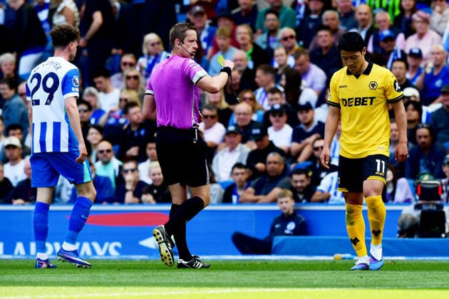 Brighton and Hove Albion v Wolverhampton Wanderers, Premier League YELLOW CARD issued to Hee Chan Hwang Forward of Wolverhampton Wanderers for his foul on Kaoru Mitoma Midfielder of Brighton and Hove Albion during the Premier League match between Brighton and Hove Albion and Wolverhampton Wanderers at the American Express Stadium, Brighton and Hove, UK on 9 May 2026. Brighton and Hove American Express Stadium East Sussex UK Editorial use only DataCo restrictions apply See www.football-dataco.com , Copyright: xJeffxMoodx PSI-24230-0033