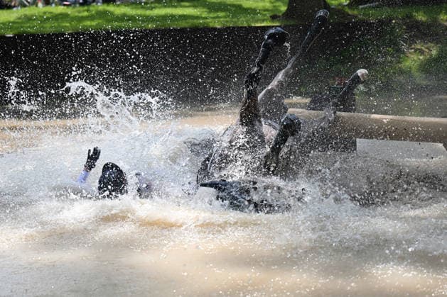 RECORD DATE NOT STATED 9th May 2026; Badminton Park, Badminton, Gloucestershire, England; Badminton Horse Trials, Day Three; Redfield Fyre ridden by Cassie Sanger of United States in trouble in the water during the cross country test SimonxWest