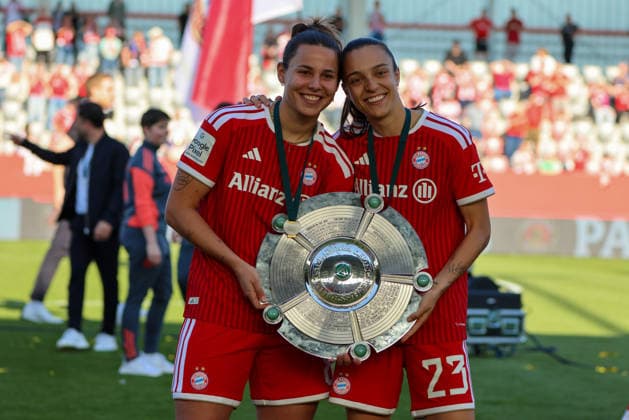 Munich, Germany 09 May 2026 1 Womens Bundesliga 25 Matchday FC Bayern Munich vs Eintracht Frankfurt In the picture from left Lena Oberdorf FCB and Natalia Padilla Bidas FCB with the championship trophy in her hand Copyright: HMBxMedia MadeleinexFantini