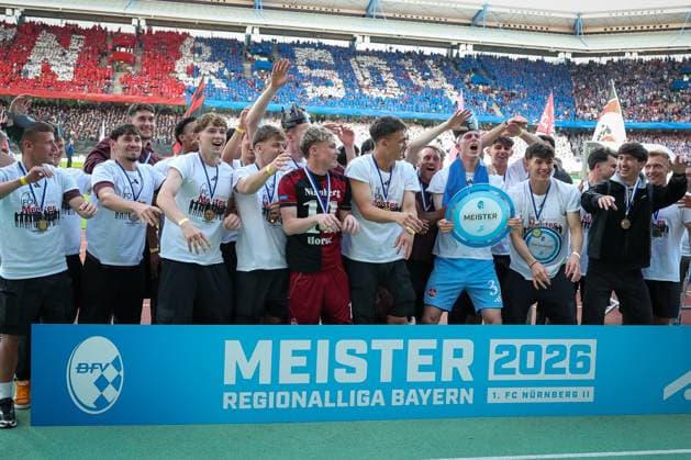 The U23 of 1 FC Nuernberg is honored for the championship in the Regionalliga Bayern, emotions, joy, 1 FC Nuernberg vs FC Schalke 04, football, men, 2 Bundesliga, DFL, season 2025 2026, 33 matchday, second round, 09 05 2026 DFB regulations prohibit any use of photographs as image sequences and or quasi video Nuernberg Bayern Germany Copyright: xkolbert-press MartinxAgüerax